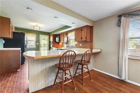 a table and chairs in a kitchen