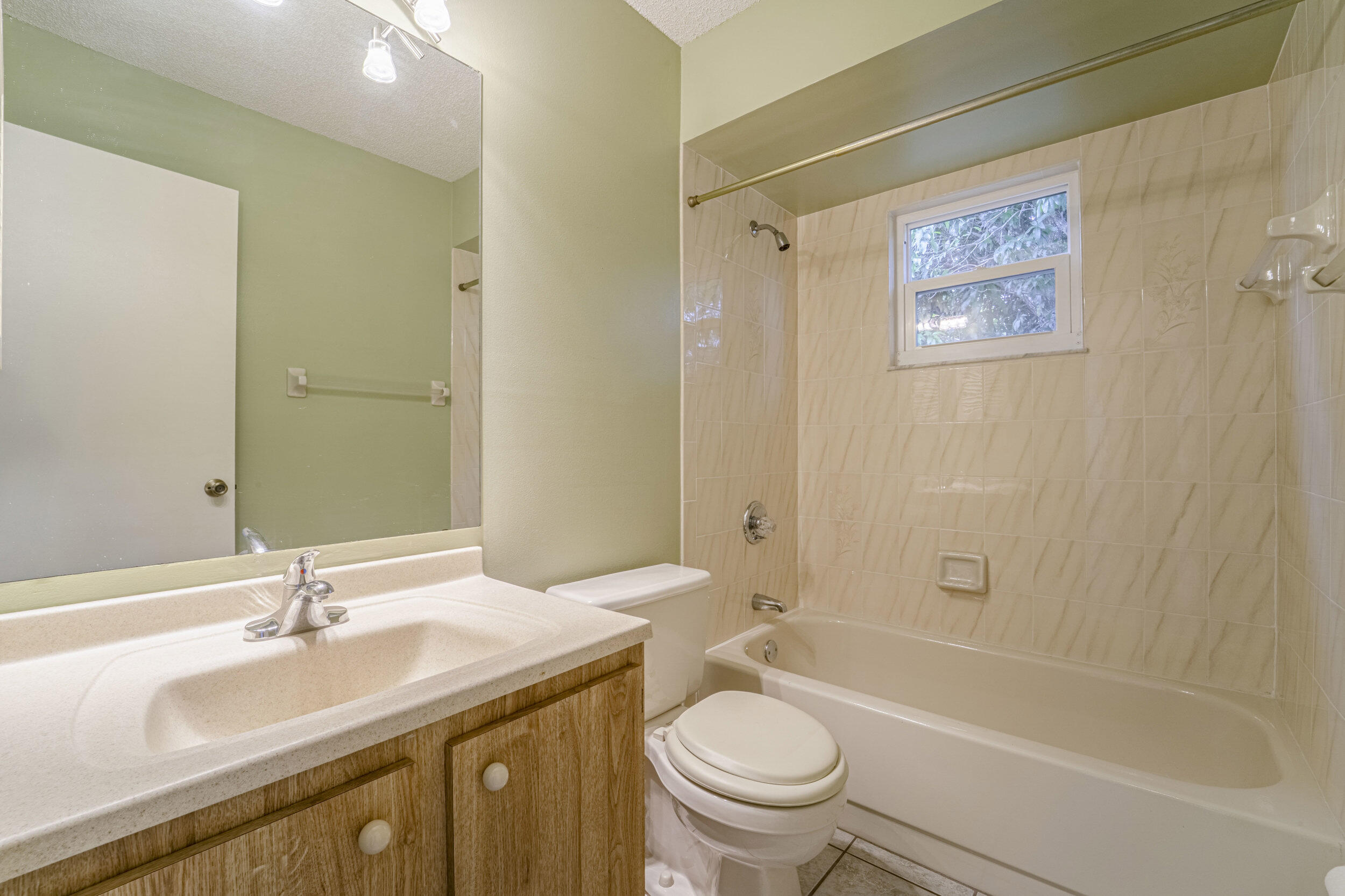 6851 Northwest Jorgensen Road Port St. Lucie, FL 34983 - Photo 12 of 37 14_main bathroom