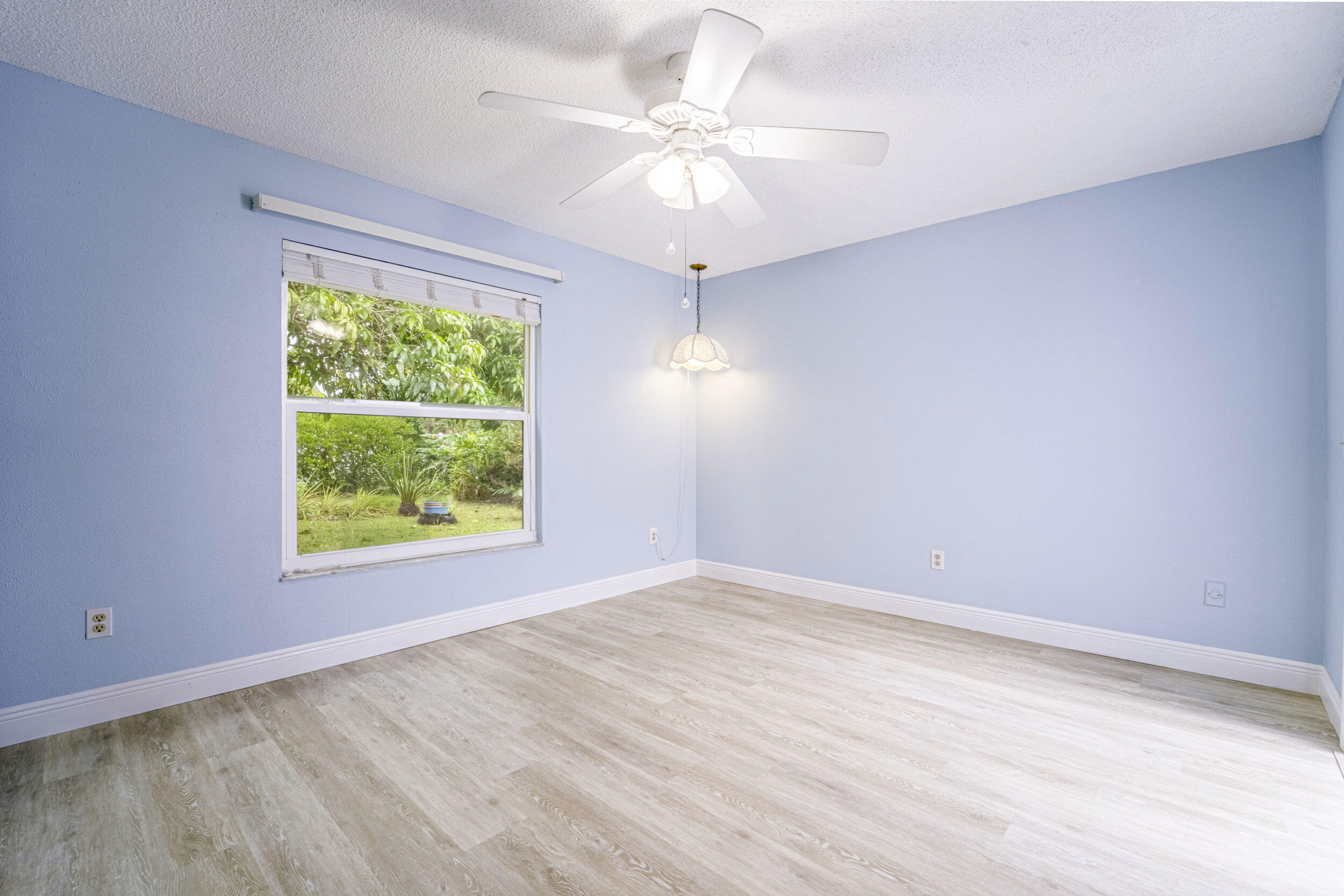 6851 Northwest Jorgensen Road Port St. Lucie, FL 34983 - Photo 15 of 37 17_primary bedroom