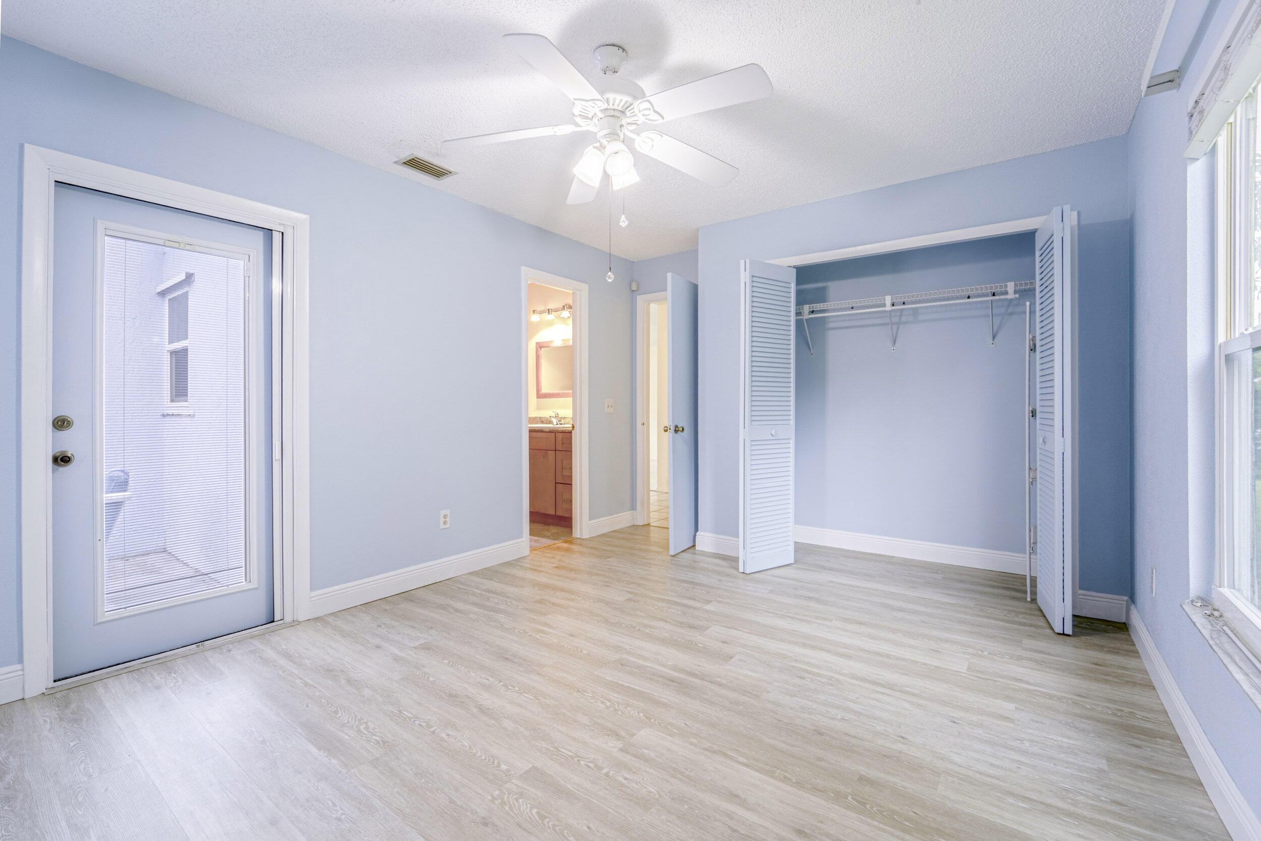 6851 Northwest Jorgensen Road Port St. Lucie, FL 34983 - Photo 16 of 37 18_primary bedroom