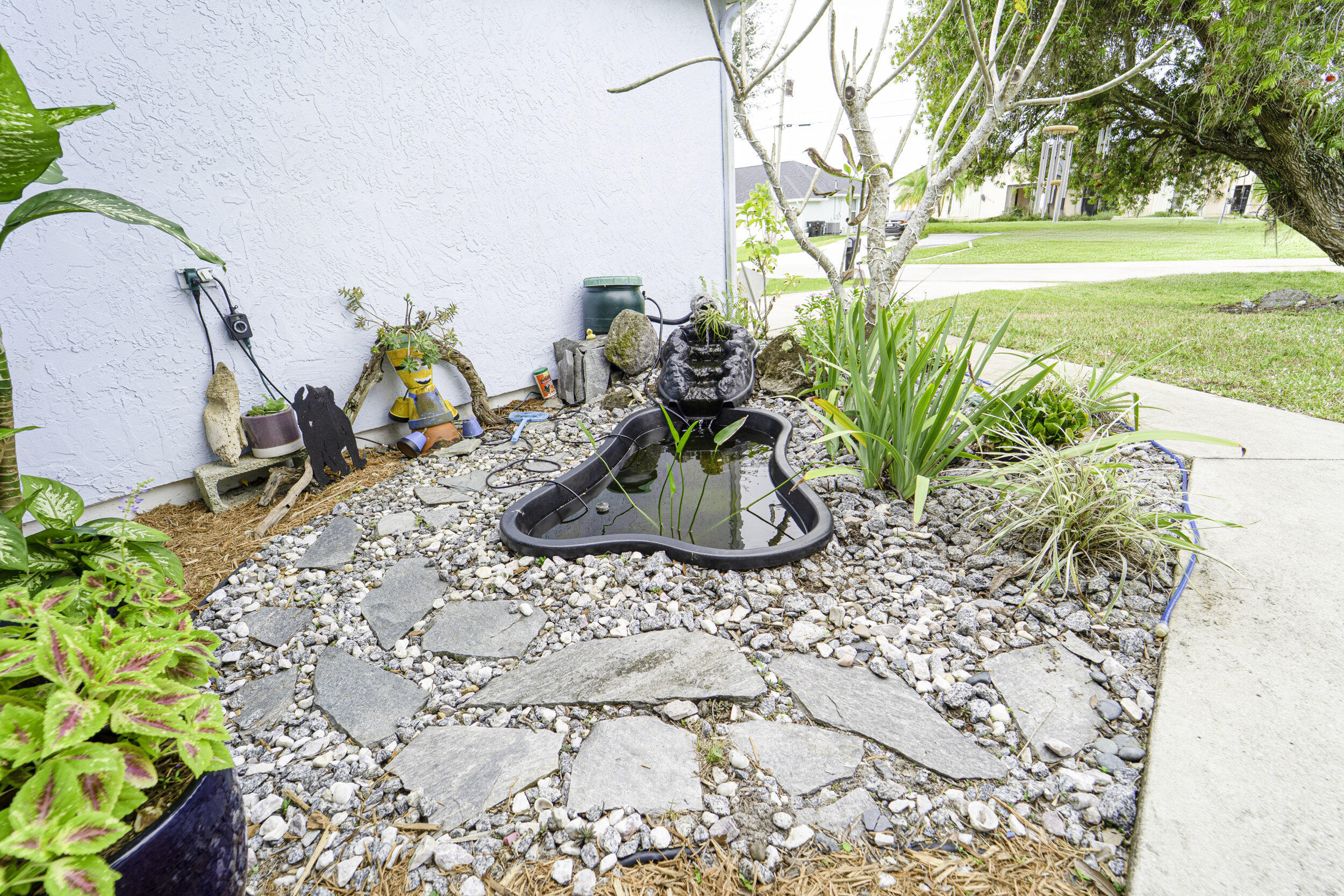 6851 Northwest Jorgensen Road Port St. Lucie, FL 34983 - Photo 23 of 37 25_koi pond