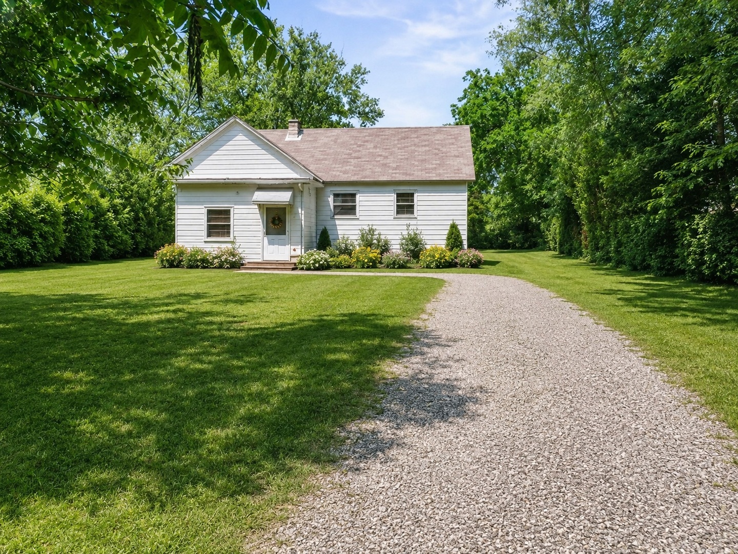 309 Landmeier Road Elk Grove Village, IL 60007 - Photo 2 of 15 a front view of a house with a yard and trees