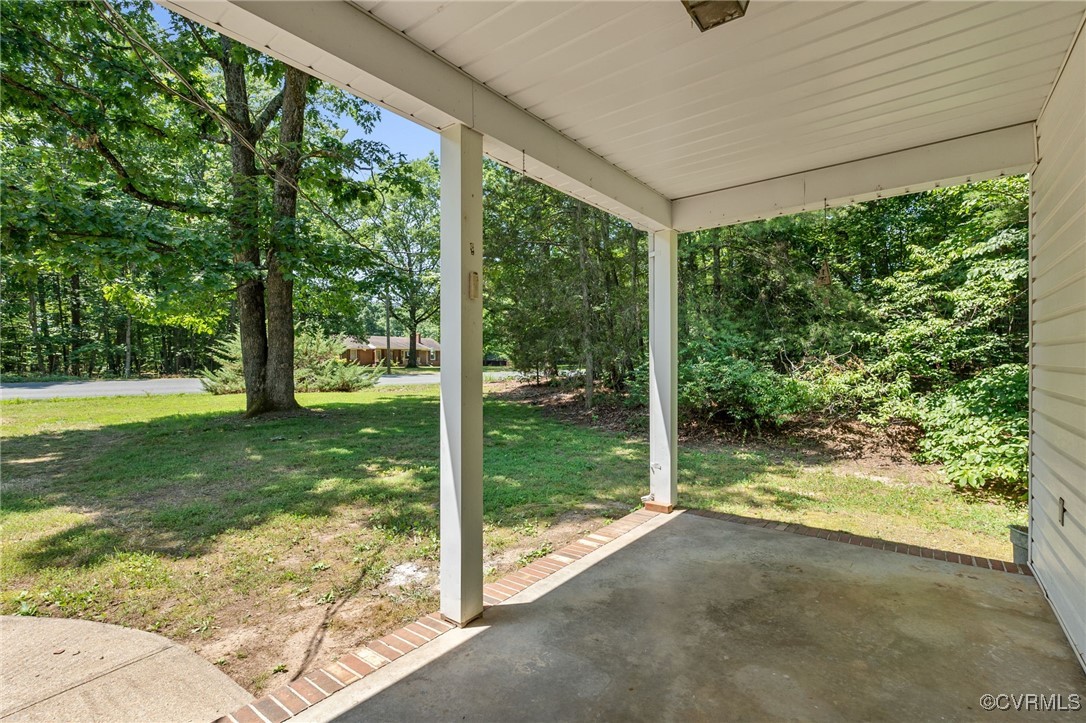 2812 Chapel Road New Canton, VA 23123 - Photo 27 of 32 a view of backyard with large trees and plants