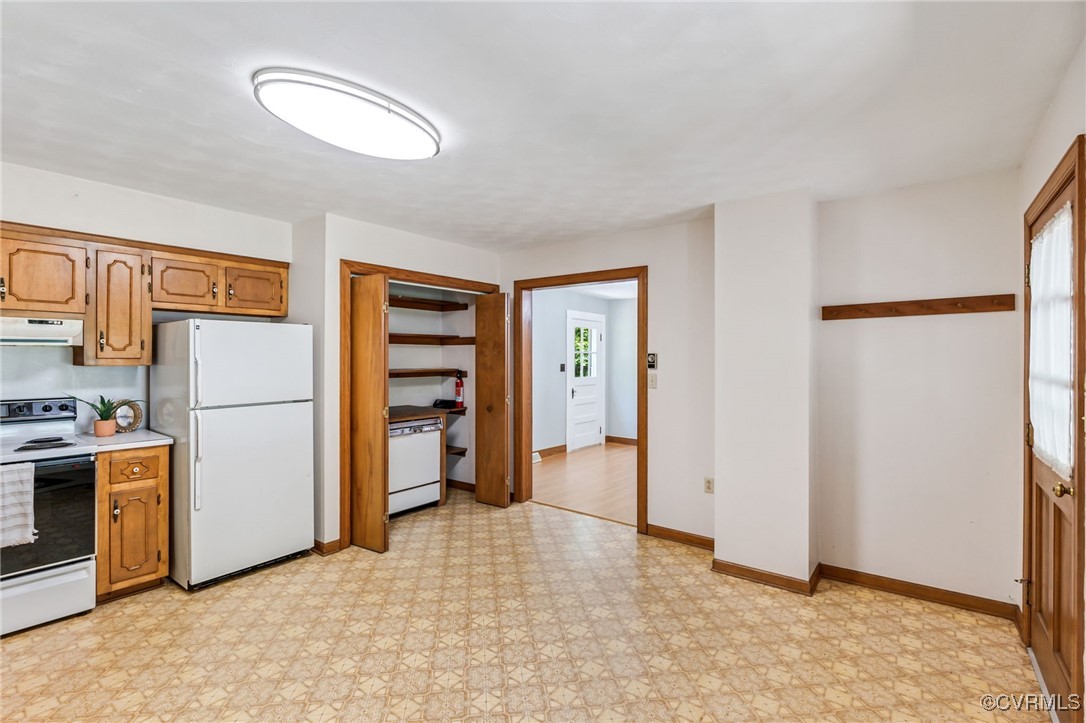 2812 Chapel Road New Canton, VA 23123 - Photo 10 of 32 a view of a kitchen with refrigerator and cabinet