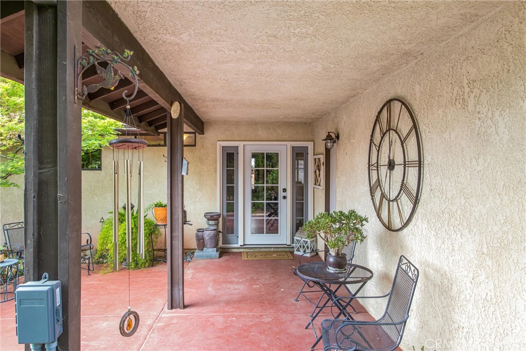 36113 Sharon Way Yucaipa, CA 92399 - Photo 32 of 49 Rear covered patio ouside living room