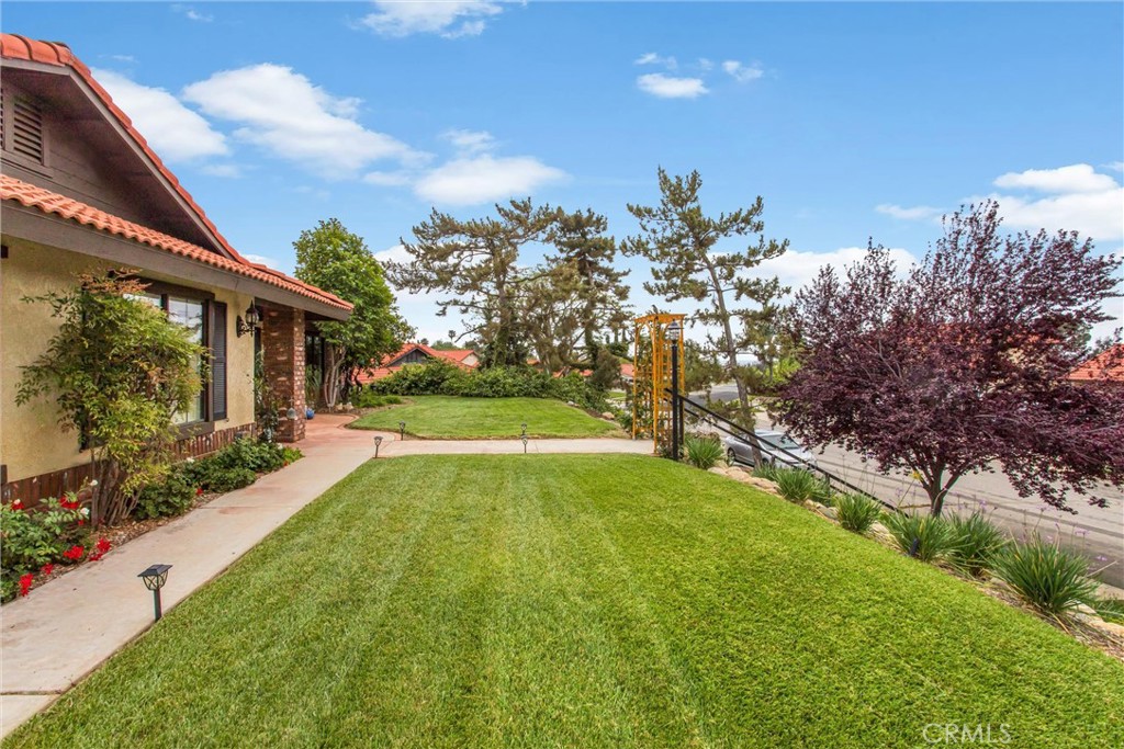 36113 Sharon Way Yucaipa, CA 92399 - Photo 7 of 49 Plenty of lawn and mature landscaping