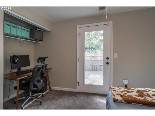 a view of balcony with wooden floor and outdoor seating
