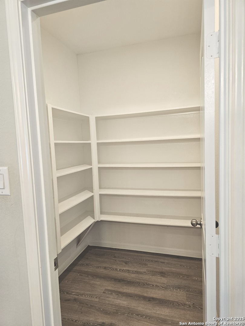 6358 Rolling Hills Road Conroe, TX 77303 - Photo 8 of 23 a view of walk in closet with empty racks