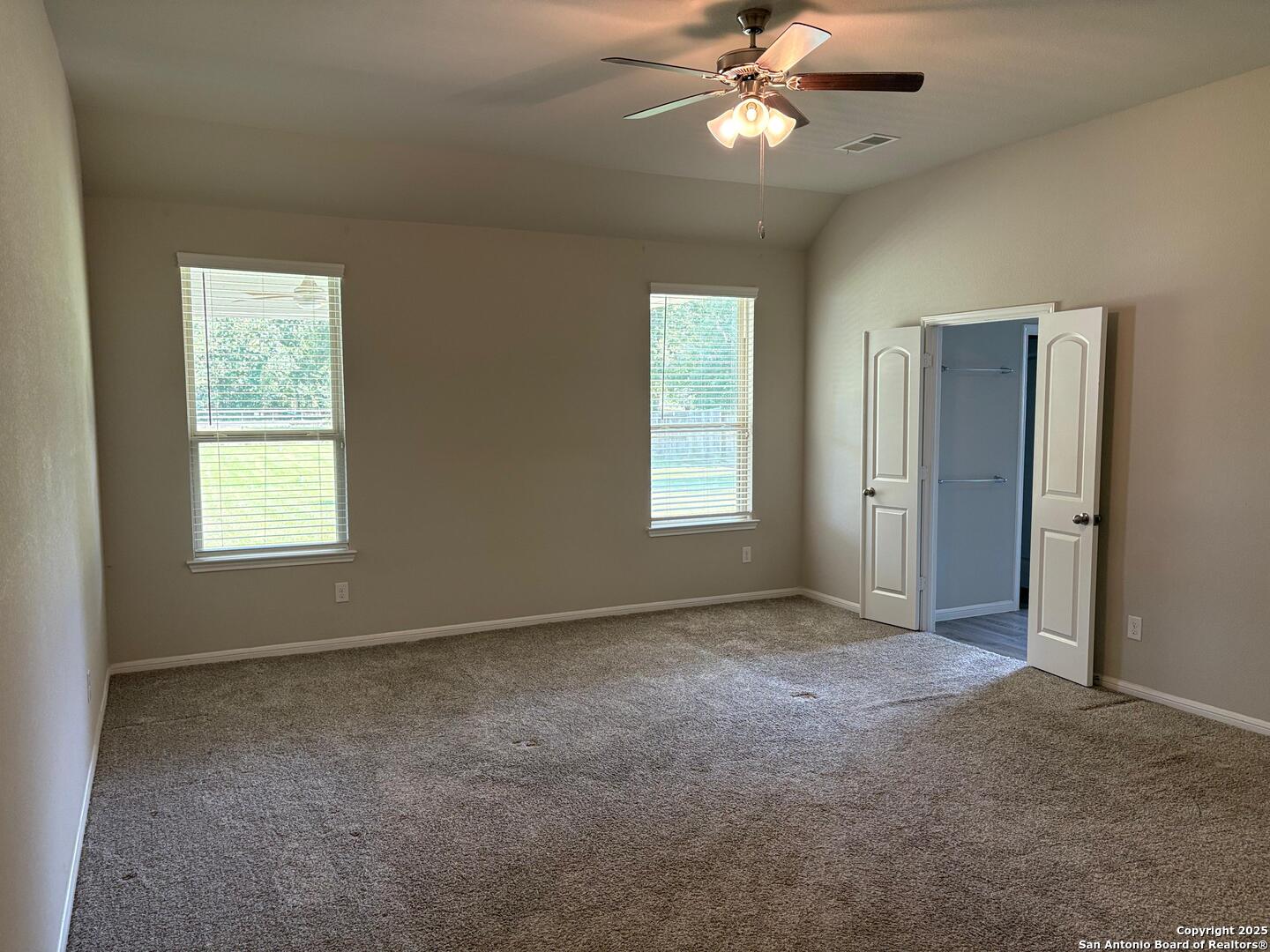 6358 Rolling Hills Road Conroe, TX 77303 - Photo 10 of 23 a view of an empty room with a window