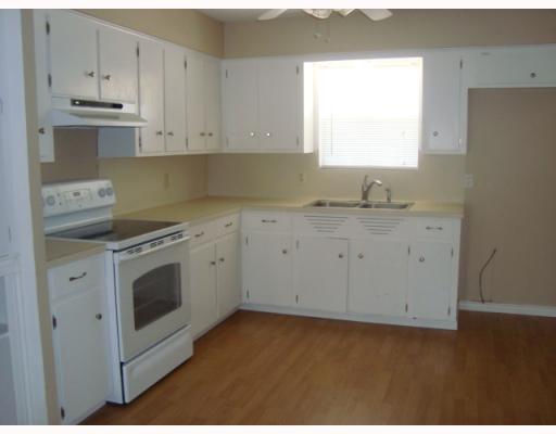 1019 Diomede Drive Portland, TX 78374 - Photo 2 of 7 a view of a kitchen with sink and cabinets