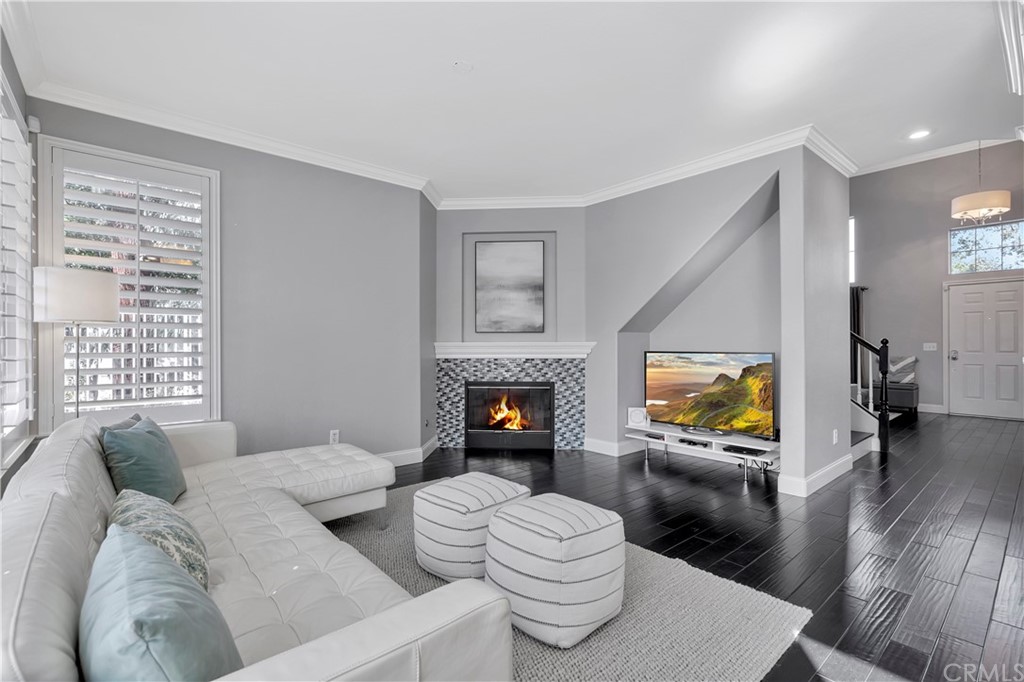 350 Exeter Way Corona, CA 92882 - Photo 13 of 56 a living room with furniture and a flat screen tv