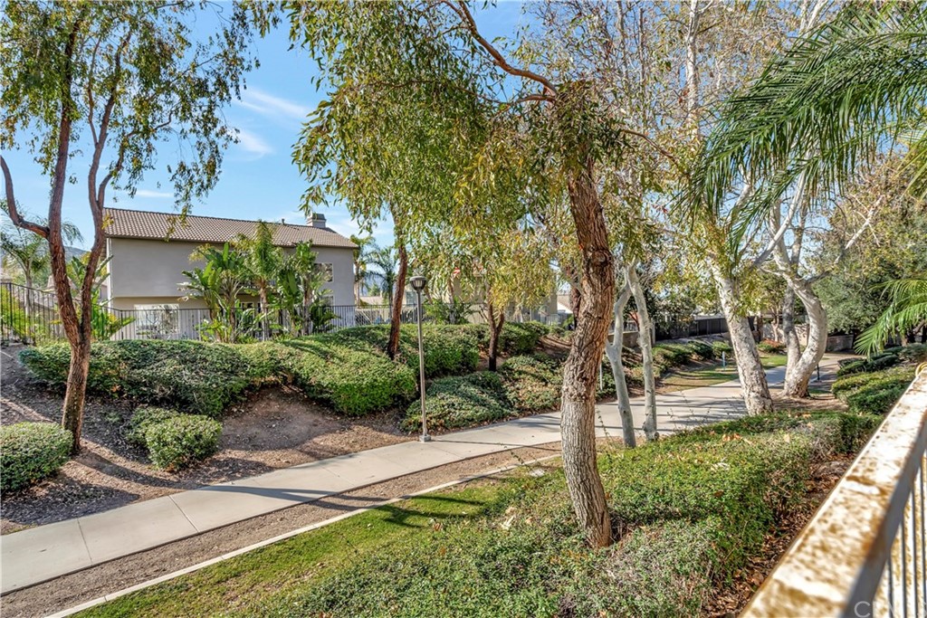 350 Exeter Way Corona, CA 92882 - Photo 27 of 56 a front view of a house with a yard
