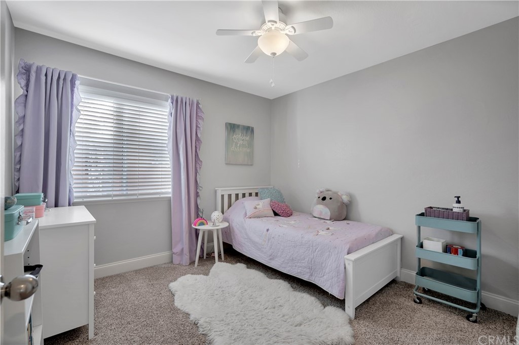 350 Exeter Way Corona, CA 92882 - Photo 45 of 56 a bedroom with a bed and a window