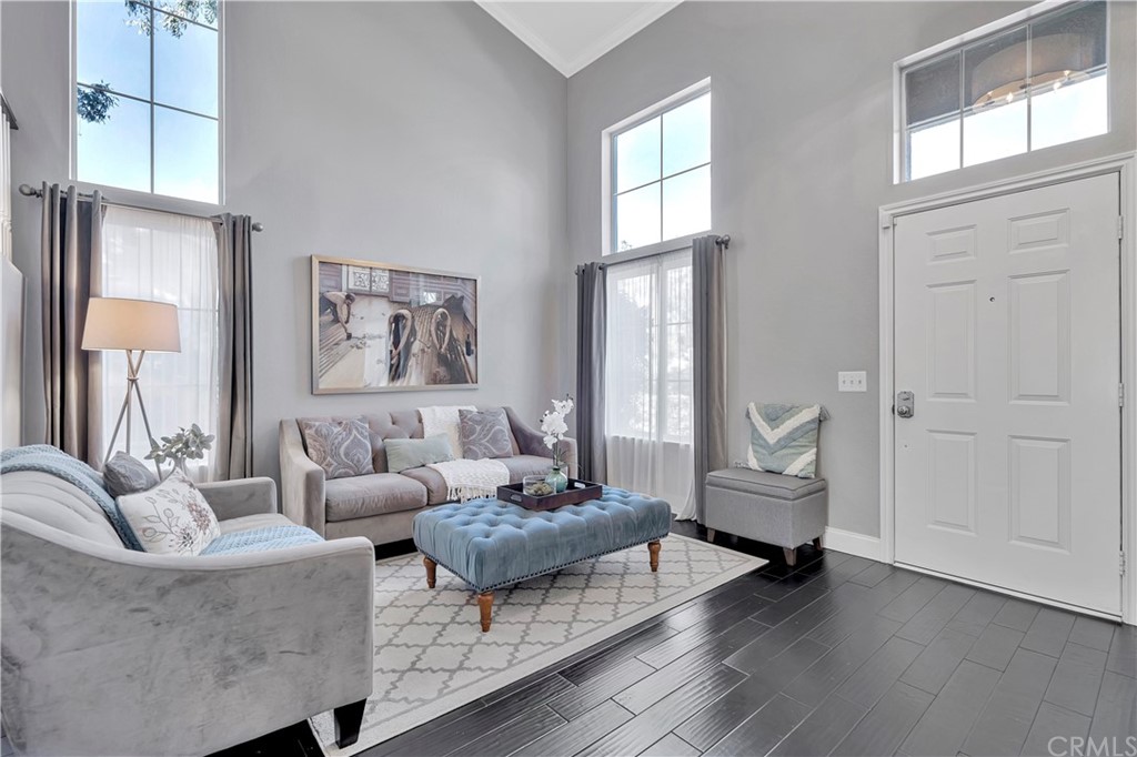 350 Exeter Way Corona, CA 92882 - Photo 5 of 56 a living room with furniture and a large window