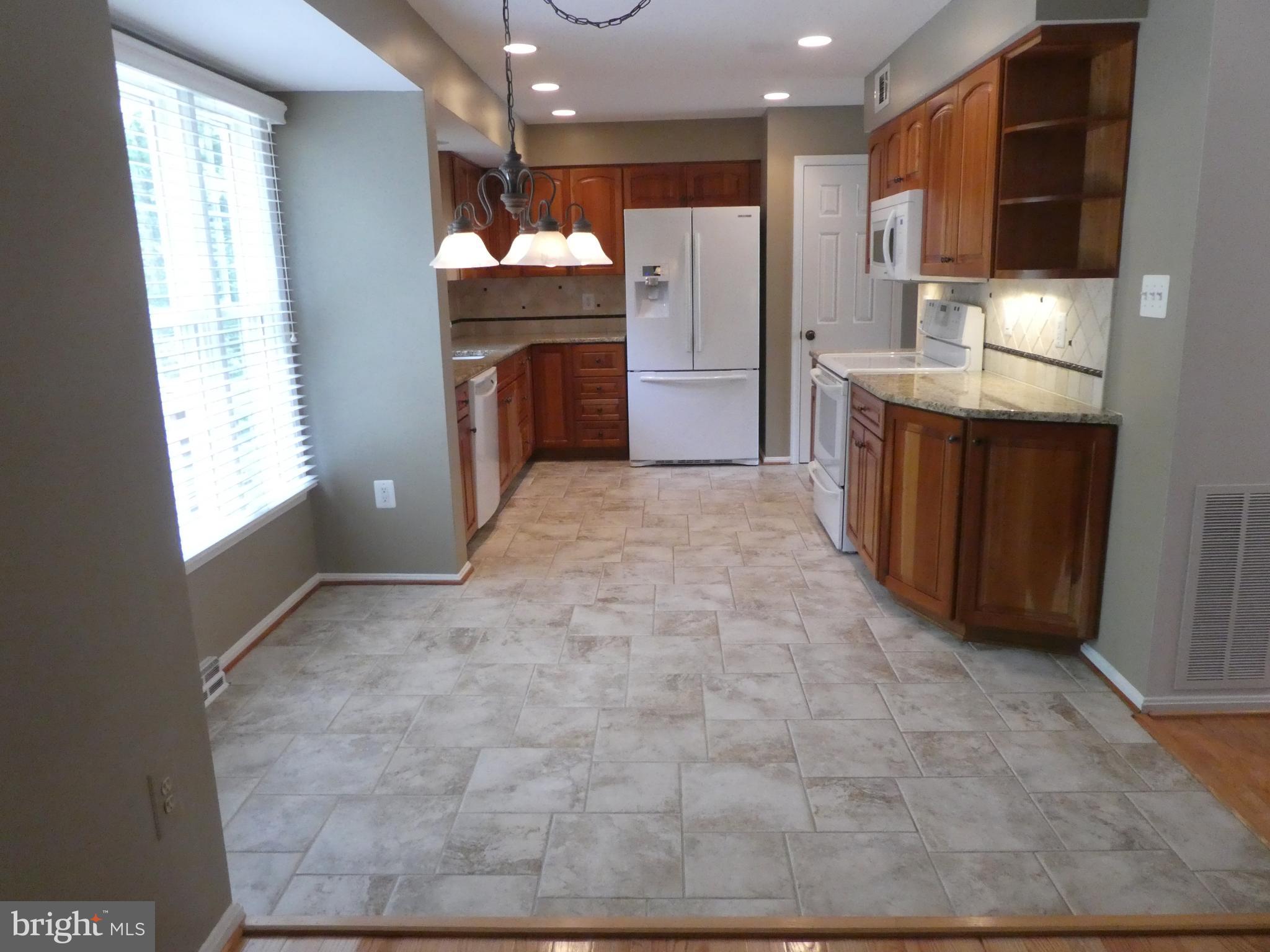 8710 Shadowlake Way Springfield, VA 22153 - Photo 14 of 80 Tile Floor, ESiK = 7 X 9, pl;us Kitchen