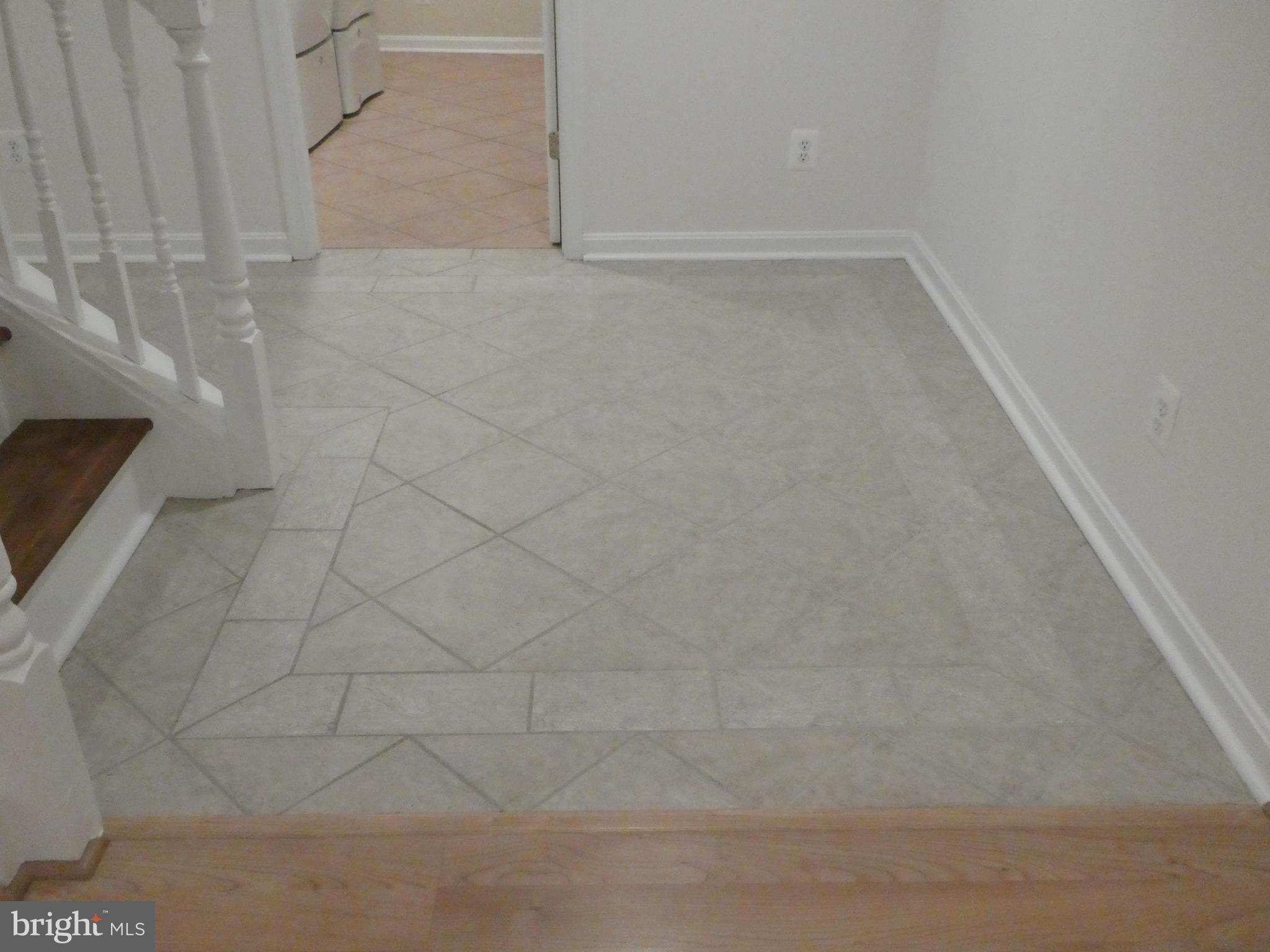 8710 Shadowlake Way Springfield, VA 22153 - Photo 53 of 80 Custom Tile Floor throughout Lower Level