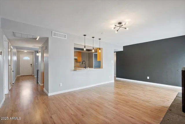 a view of a livingroom with a hardwood floor