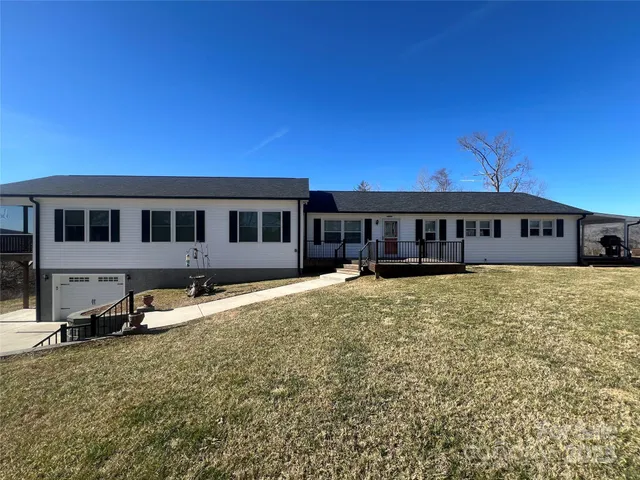 a view of a house with a roof deck