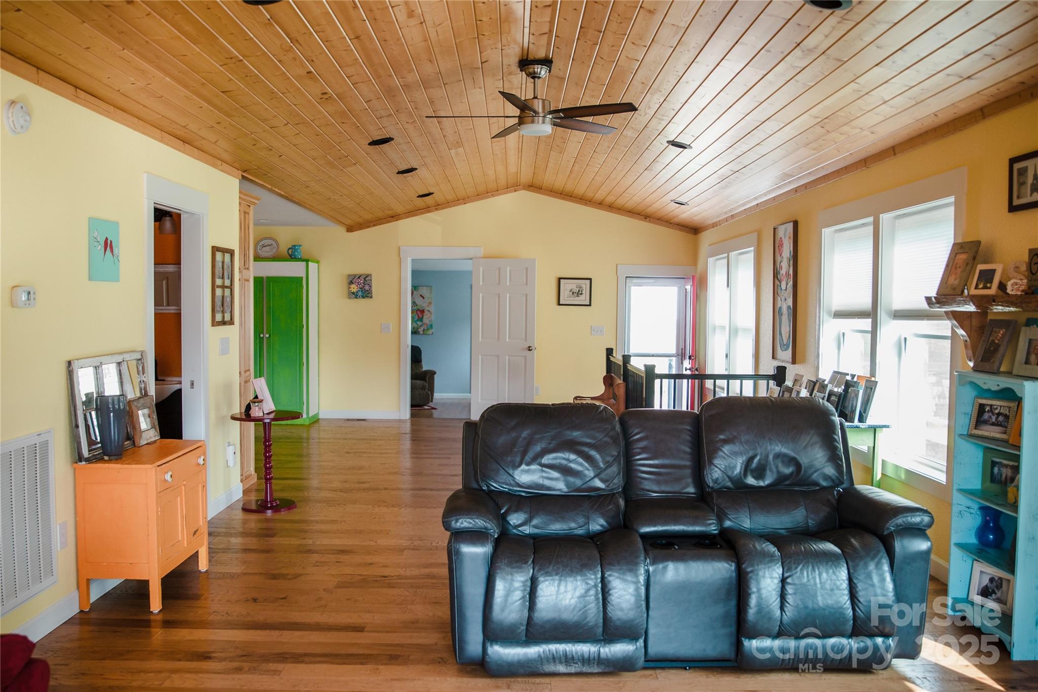 1086 Carters Ridge Road Spruce Pine, NC 28777 - Photo 11 of 47 a living room with furniture and wooden floor