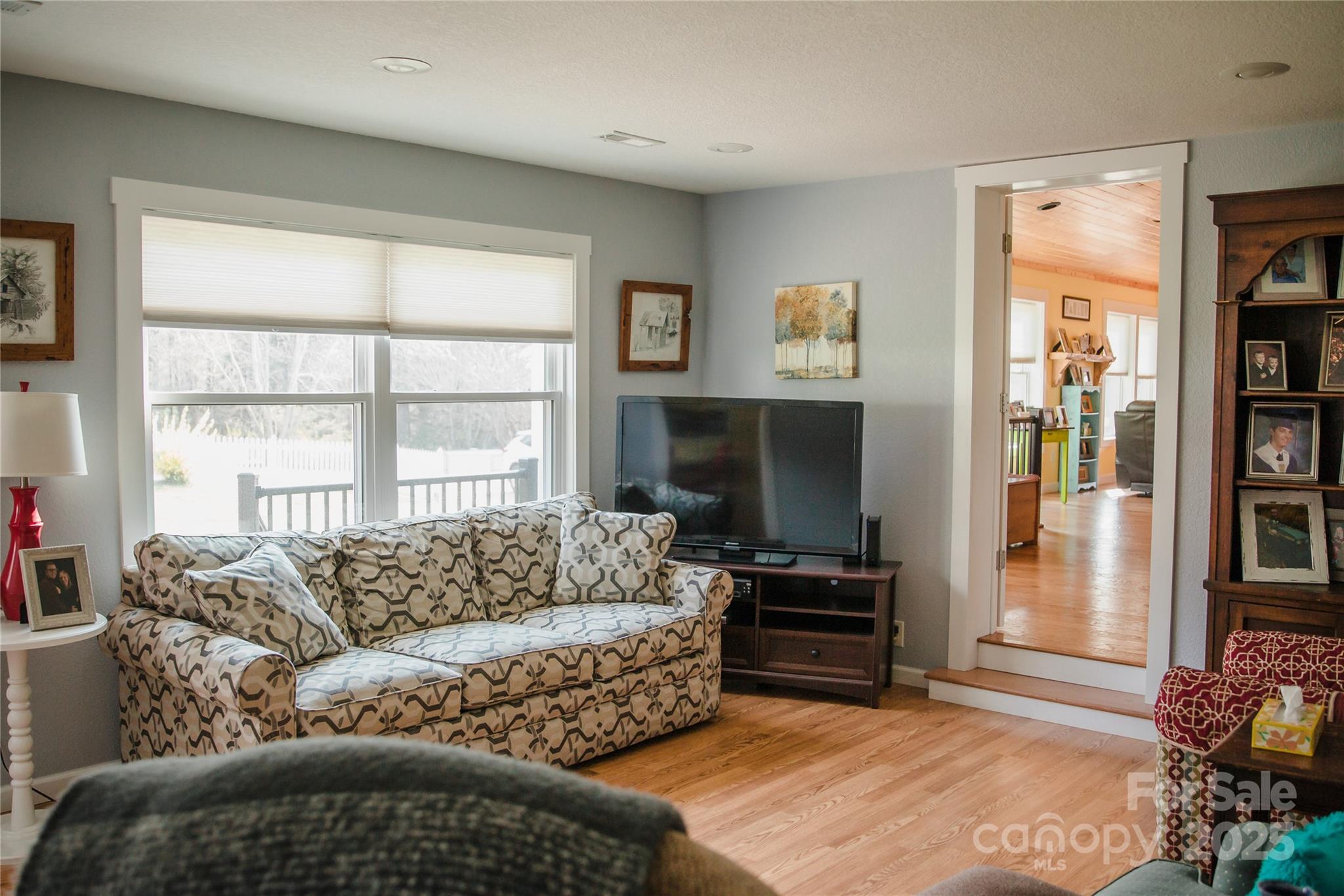 1086 Carters Ridge Road Spruce Pine, NC 28777 - Photo 23 of 47 a living room with furniture and a flat screen tv