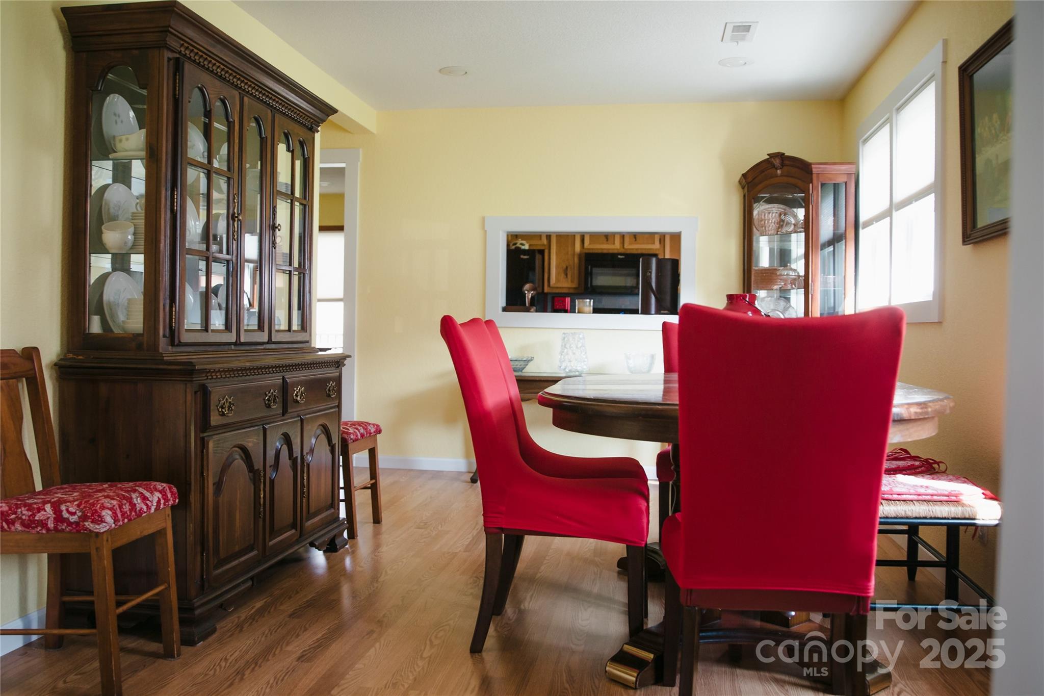 1086 Carters Ridge Road Spruce Pine, NC 28777 - Photo 30 of 47 a view of a dining room with furniture and chandelier