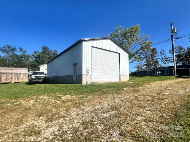 a view of a backyard with a garden