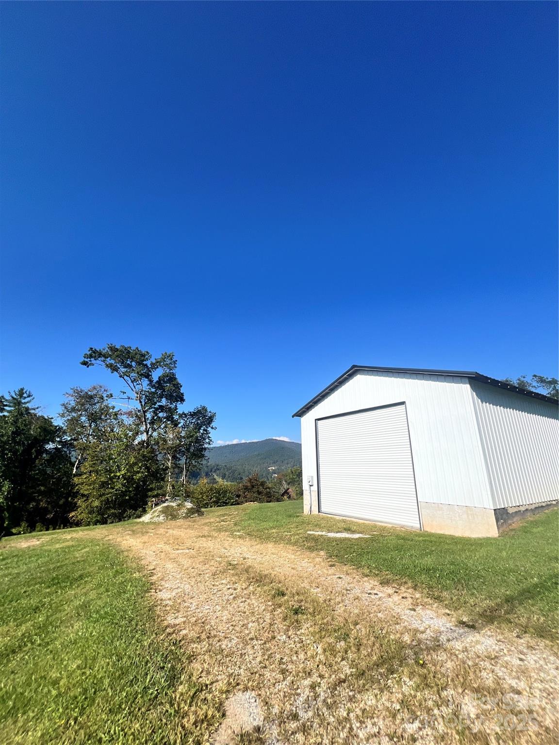 1086 Carters Ridge Road Spruce Pine, NC 28777 - Photo 47 of 47 a view of a backyard of the house