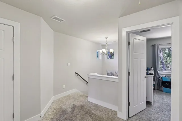 a view of a room that has a bench in it