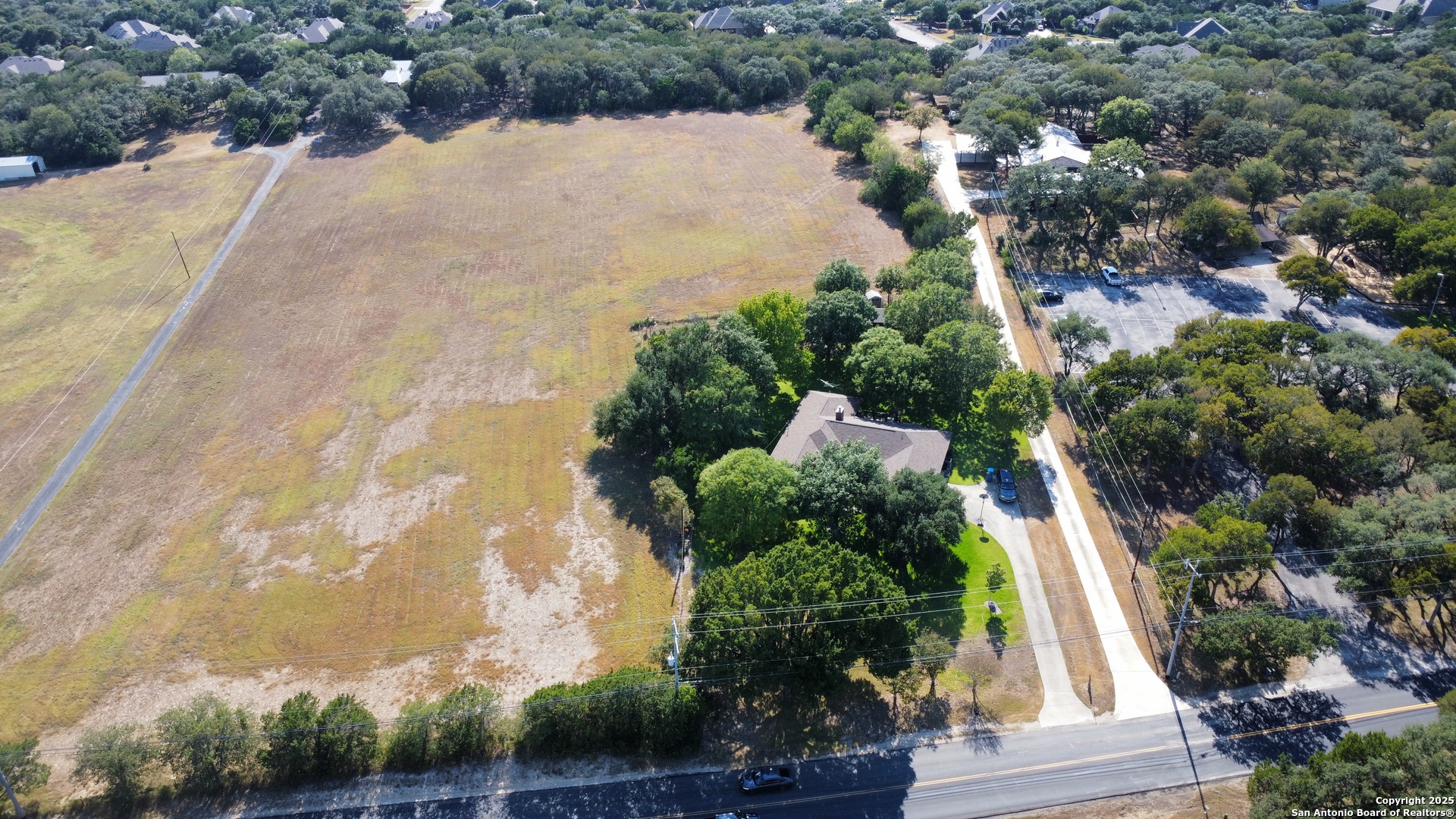 0 Bat Cave Garden Ridge, TX 78266 - Photo 6 of 8 an aerial view of house with yard and outdoor seating