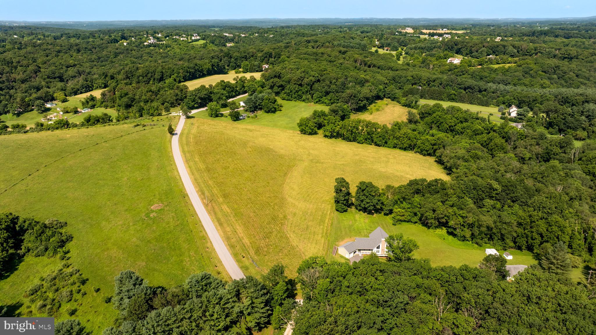 Eagle Mill Road Freeland, MD 21053 - Photo 13 of 36 a view of a lake with a houses yard