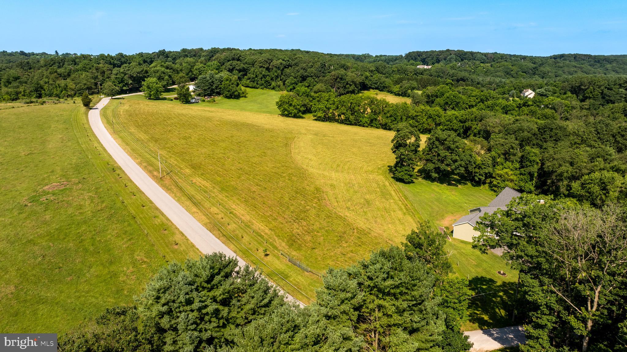 Eagle Mill Road Freeland, MD 21053 - Photo 14 of 36 a view of a lake with a mountain in the background