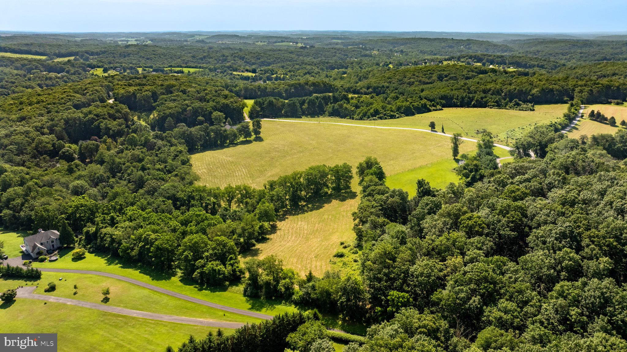 Eagle Mill Road Freeland, MD 21053 - Photo 6 of 36 a view of a lake with a mountain