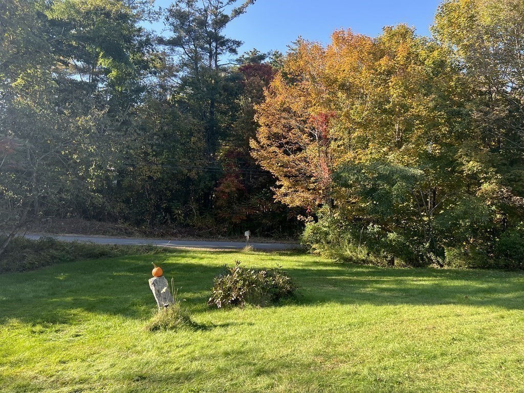 205 Lincoln Road Phillipston, MA 01331 - Photo 1 of 17 a view of a golf course with a lake