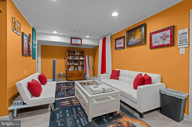 a living room with furniture and rug