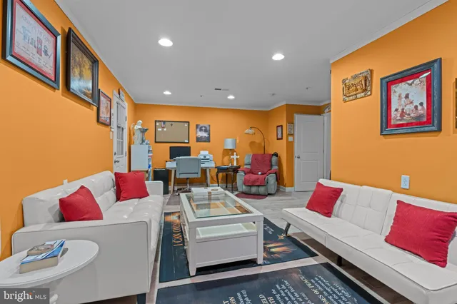 a living room with furniture and a couch