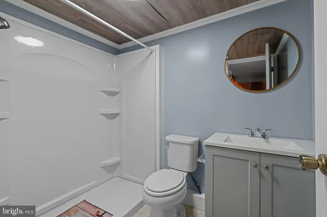 a bathroom with a toilet and a sink