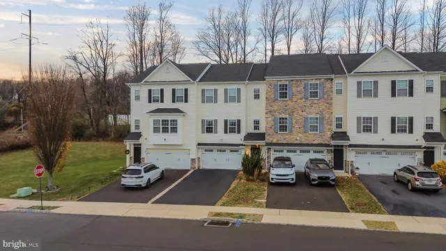 a car parked in front of a house