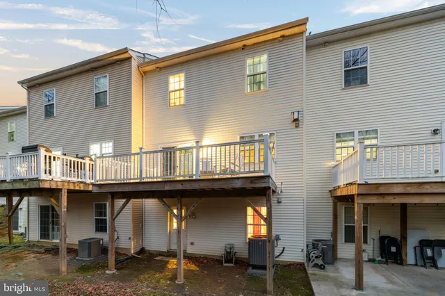 a front view of a house with parking