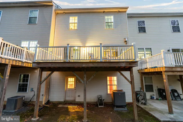 a front view of a house with parking