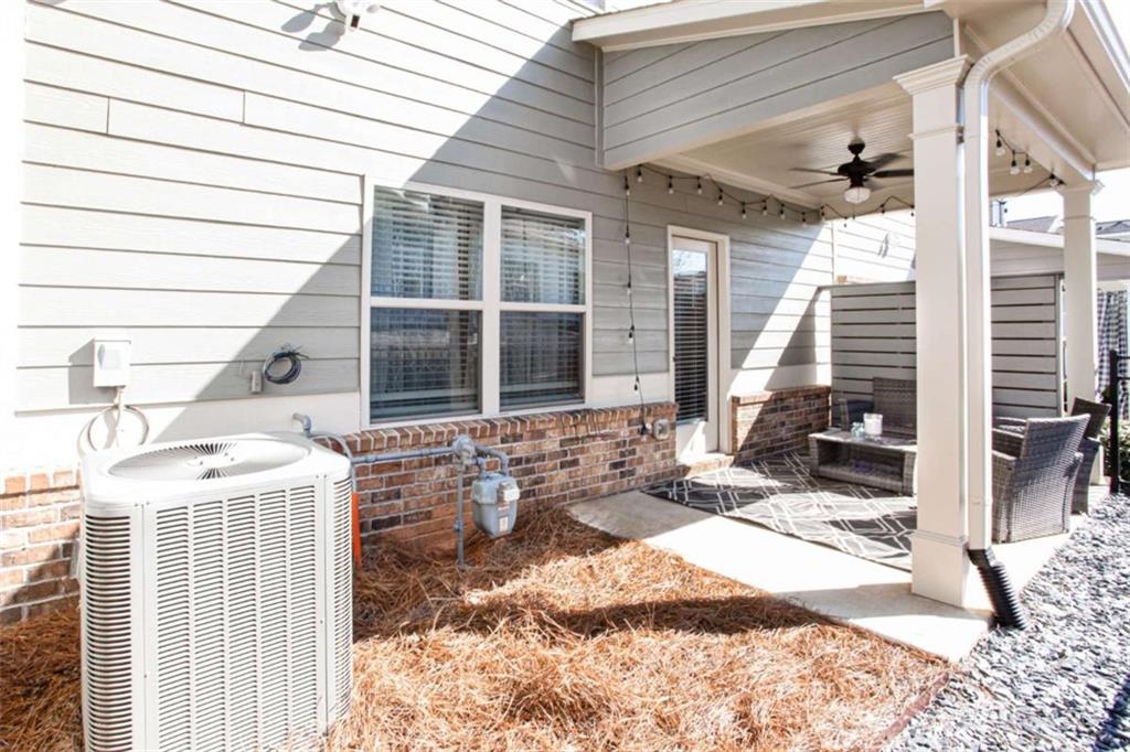 95 Bromes Street Lawrenceville, GA 30046 - Photo 30 of 37 a front view of a house with outdoor seating