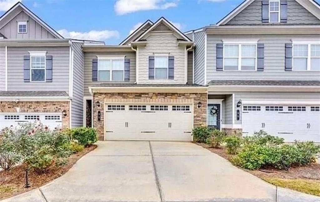 95 Bromes Street Lawrenceville, GA 30046 - Photo 32 of 37 a view of a house with a street