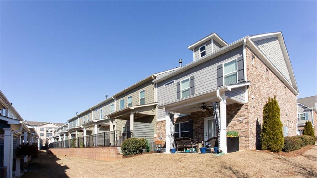 95 Bromes Street Lawrenceville, GA 30046 - Photo 37 of 37 a front view of a building with a street