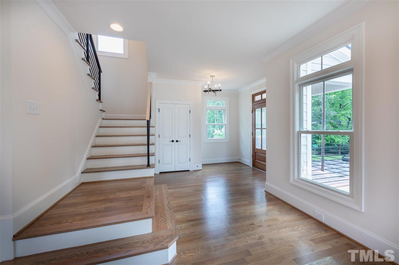 1439 Nottingham Road Raleigh, NC 27607 - Photo 4 of 23 a view of entryway and hall with wooden floor