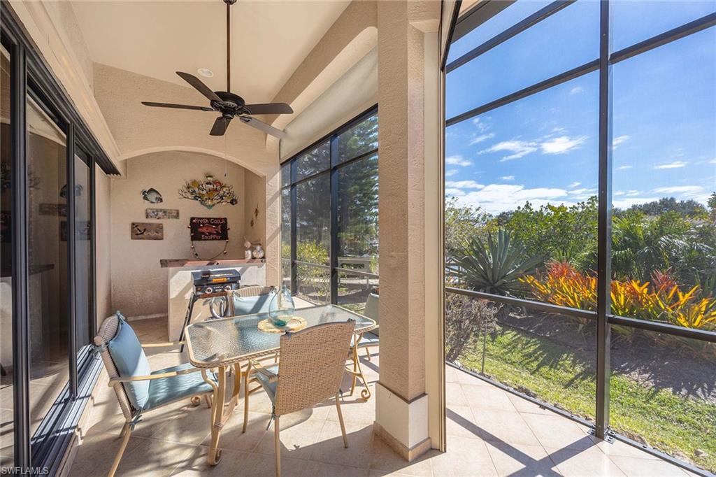 146 Windward Cay Naples, FL 34114 - Photo 23 of 33 a view of a dining room with furniture window and outside view