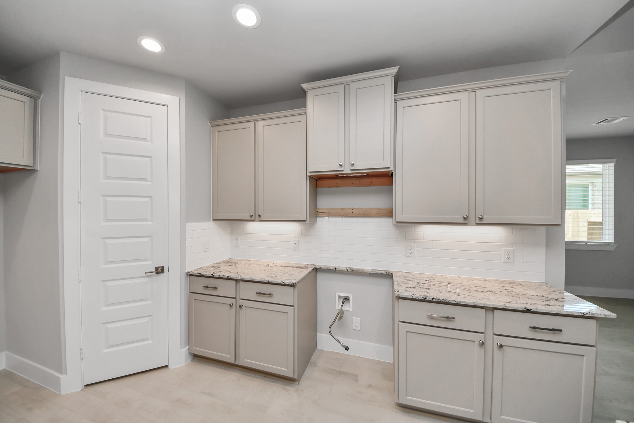 3043 Native Spg Drive Spring, TX 77373 - Photo 11 of 45 The open concept effortlessly connects the kitchen to the expansive family room, forming a perfect hub for gatherings. This seamless flow creates an inviting space where cooking and socializing come together harmoniously.