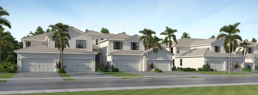 5632 Summit Pointe Circle, Unit 103 Bradenton, FL 34210 - Photo 1 of 1 a front view of a white building