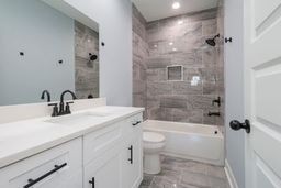 4349 Goins Road Nashville, TN 37211 - Photo 12 of 20 a bathroom with a sink a toilet and shower