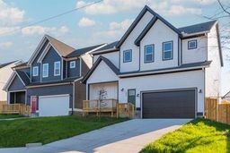 4349 Goins Road Nashville, TN 37211 - Photo 5 of 20 a front view of a house with a garden and garage