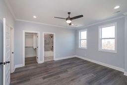 4349 Goins Road Nashville, TN 37211 - Photo 6 of 20 a view of an empty room with wooden floor and a window