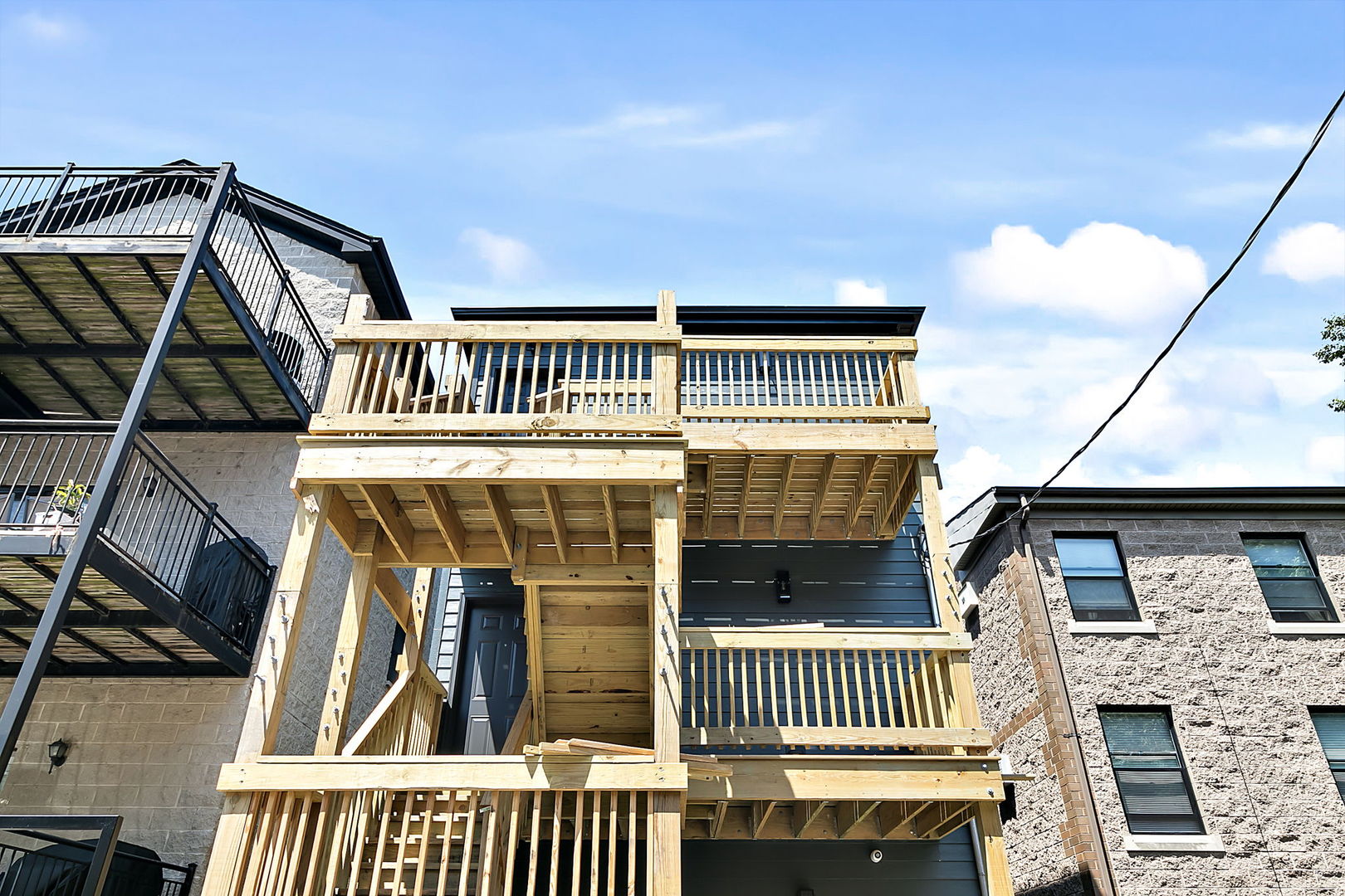 643 East 50th Street Chicago, IL 60615 - Photo 22 of 22 a view of a house with wooden deck